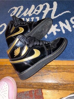 Nike Black and Gold High-Top Sneakers